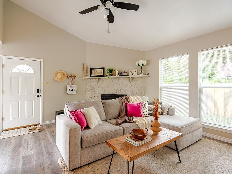 Brand new flooring, windows, paint, blinds throughout