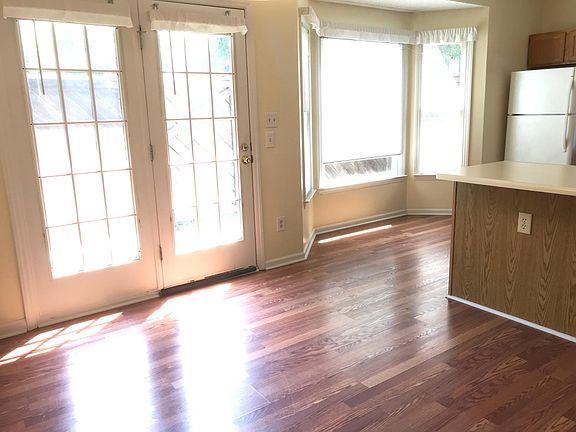 Large windows and French doors to side patio