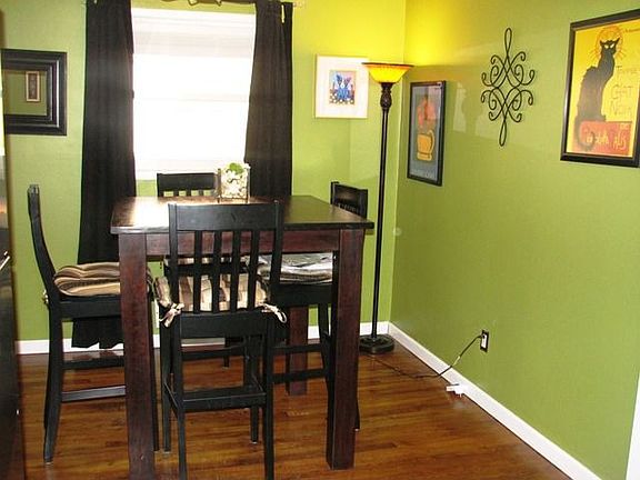 Separate dining room open to living room and the renovated kitchen
