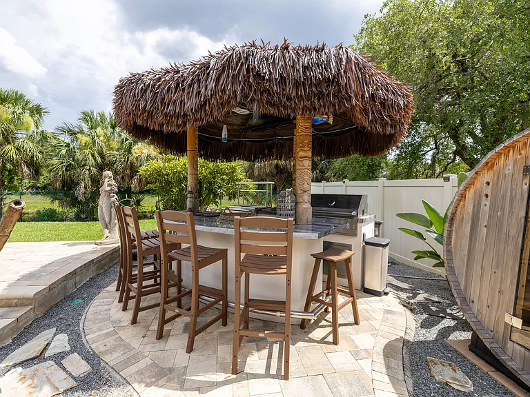 Tiki Bar, Grill, Bar Fridge, Drink Station, Sink, and Sauna