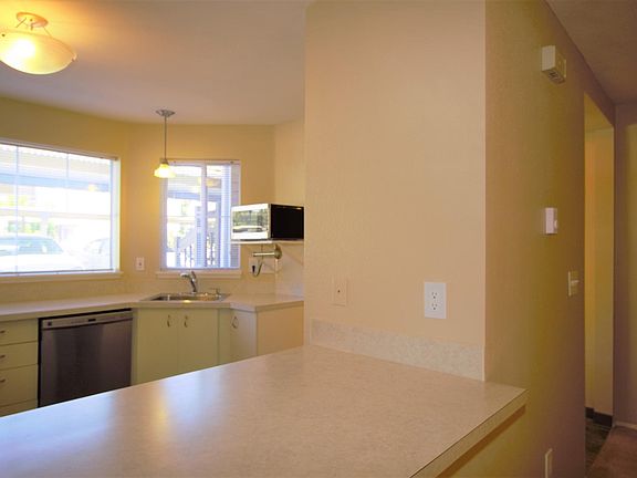 Looking back at kitchen from dining room - perfect for entertaining.