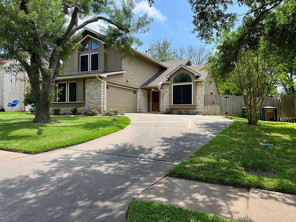 Beautiful curb appeal with a two-car garage and sidewalks on both sides of the street. House is nicely set back from the quiet road.