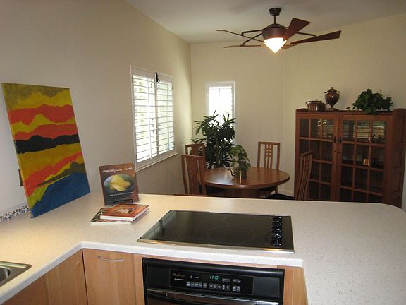 Kremodeld kitchen features maple cabinets and a breakfast area