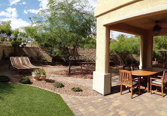 Large Backyard with Paver Patio, Synthetic Grass and Mature Landscaping