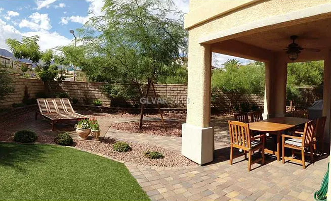 Large Backyard with Paver Patio, Synthetic Grass and Mature Landscaping
