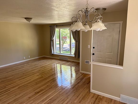 Living room with refinished oak floors