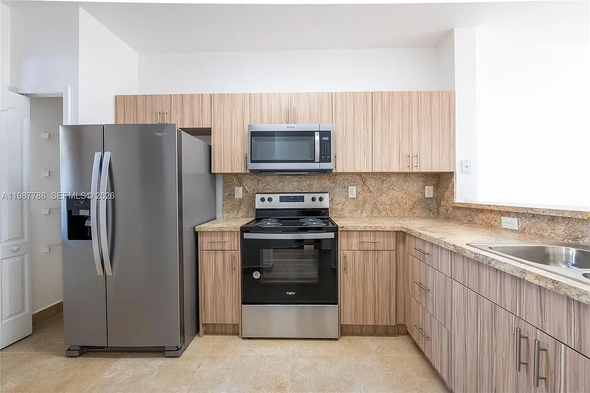 Building Photo - 7200 NW 177th St #109-7
