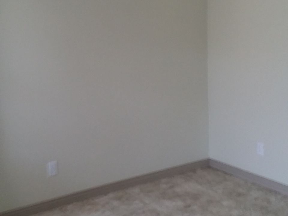 ONE OF TWO BEDROOMS