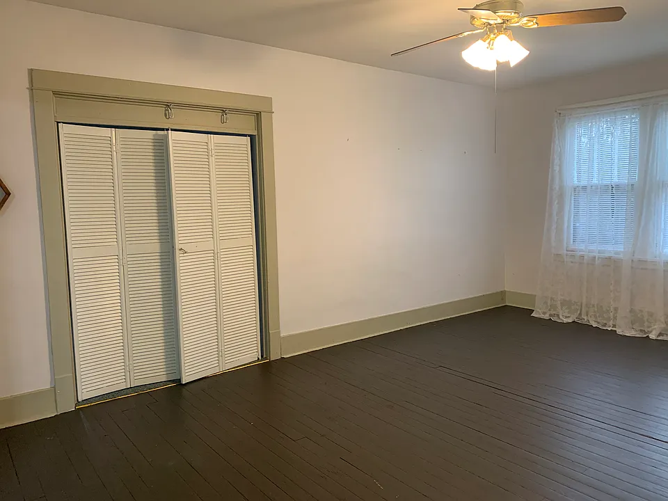 Living room. Shutter doors lead to the 'bonus room.'