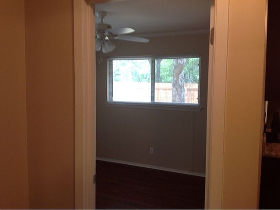 Bedrooms have laminate flooring, ceiling fans and blinds