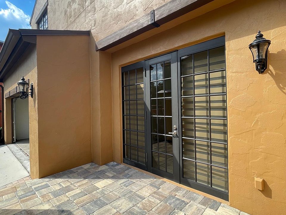 new patio tiles with privacy wall