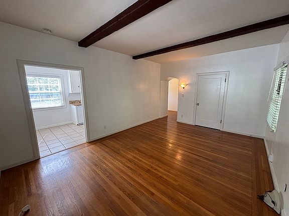 Living Room with high beamed ceilings