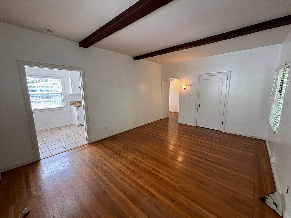 Living Room with high beamed ceilings
