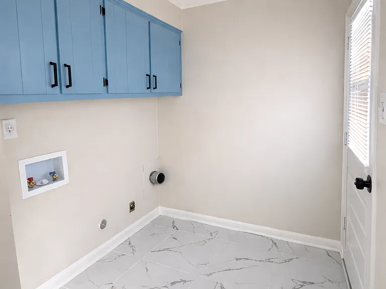 Wash machine room & exit to garden