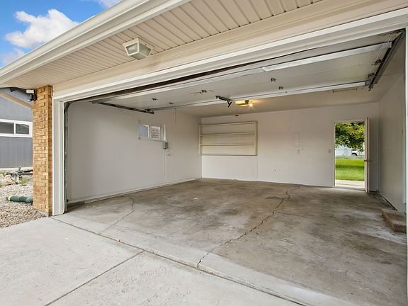 Clean, 406 square foot garage with access to the backyard