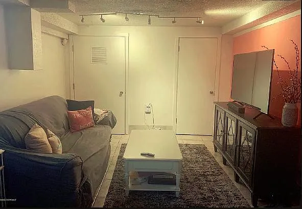 Old and not very good photos. Living area. Note there isn't a TV in this apartment.