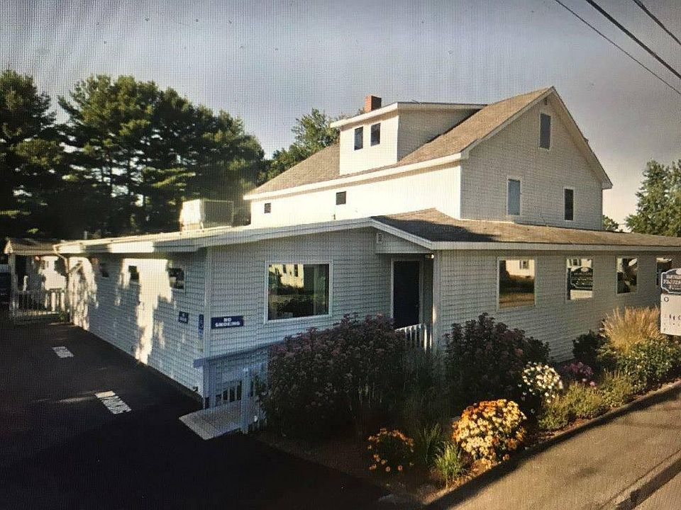 Outside of building. Apartment on second floor, entrance up ramp.