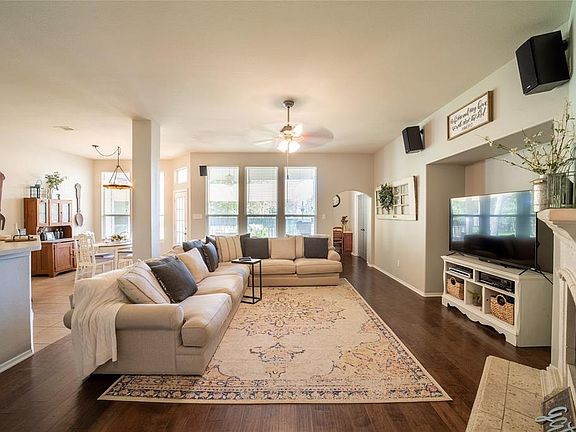 Light and bright living area with gorgeous wood floors!