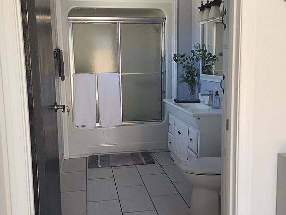 Large bathroom with radiant floor heat under tiles