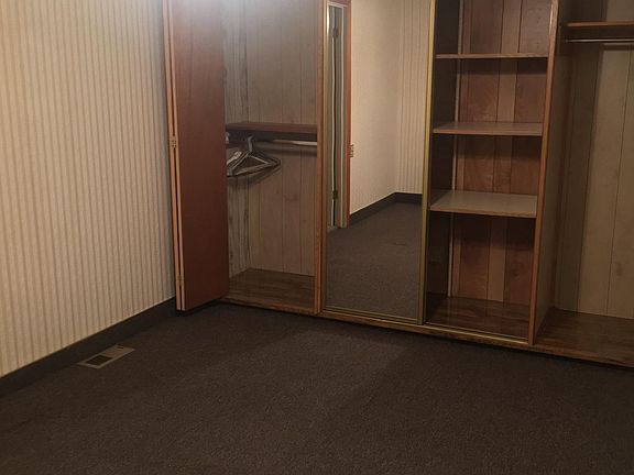 ONE OF TWO BEDROOMS