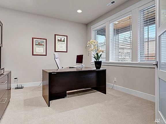 What a relaxing office space -- so much light -- check out those windows!