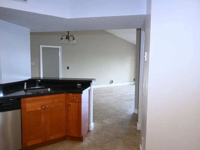 8721 Wiles Rd #305 — Photo 45