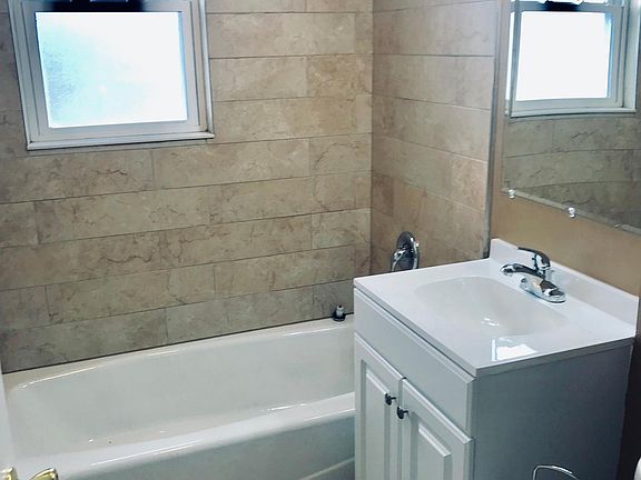 New bathroom all tile with closet