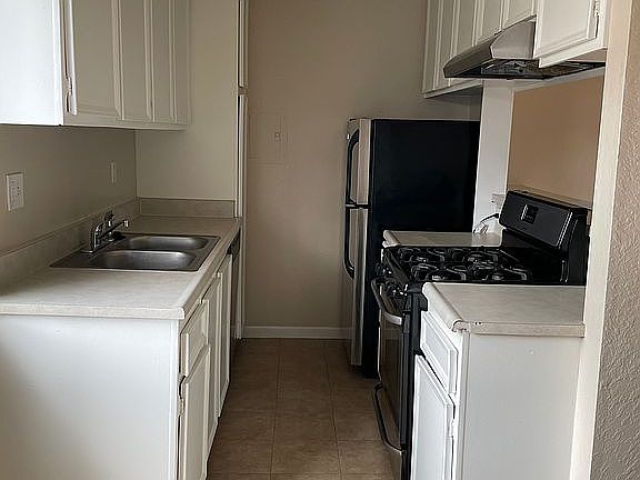 Kitchen From Dining Area