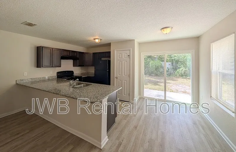 Building Photo - 7800 Playschool Ln
