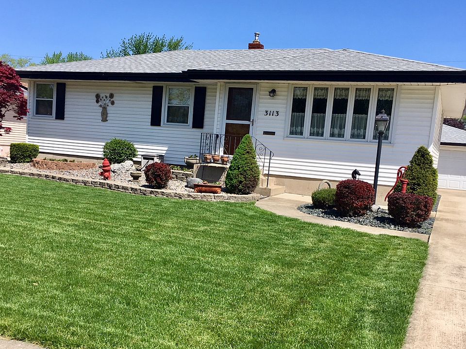 Great curb appeal, lush lawn