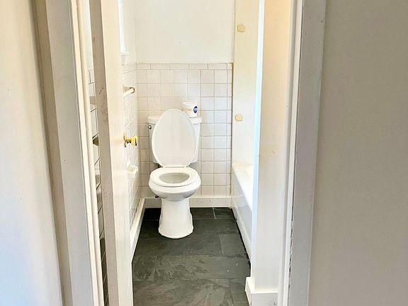 Bathroom with slate tile floor
