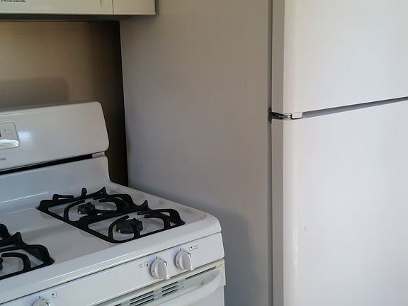 Microwave, Oven and Refrigerator included.