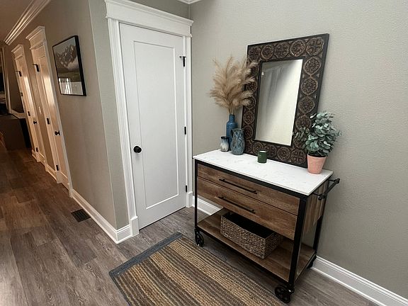 Light and bright front hallway - with coat closet.