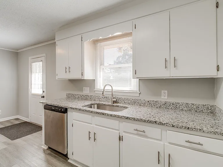 7712 Burdell Dr — Photo 10