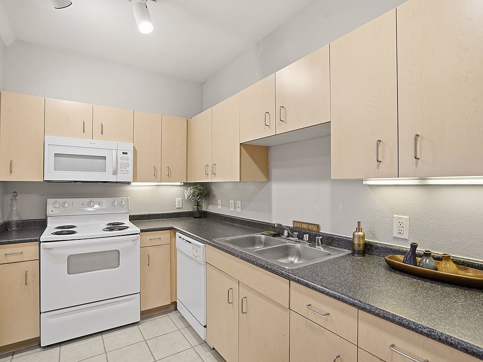 Kitchen with undercabinet lighting and plenty of space for all small appliances