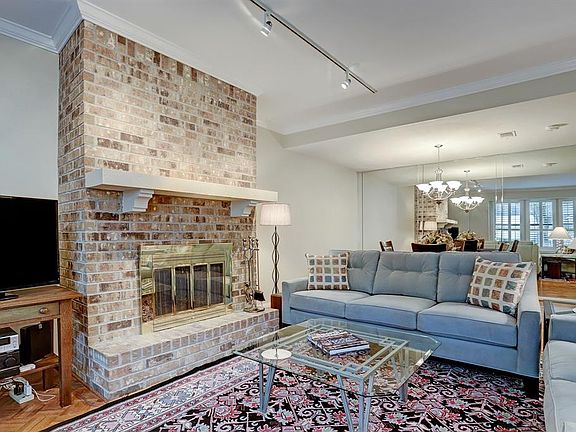 Attractive brick feature fireplace.