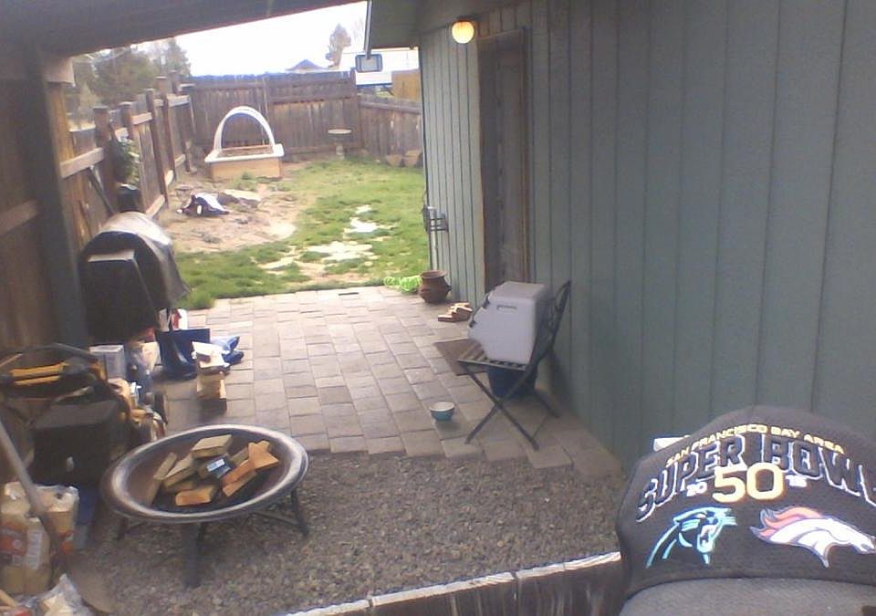View of entrance and part of yard