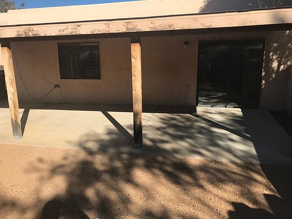 Oversized covered patio, spans the entire length of home.
