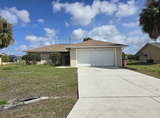 1239 Ermine St E, Lehigh Acres, FL 33974