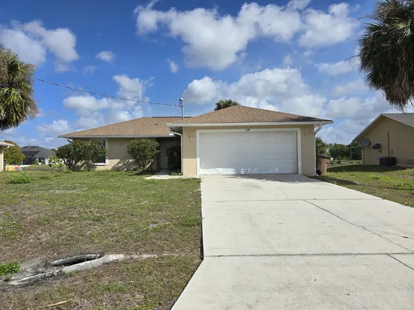 1239 Ermine St E, Lehigh Acres, FL 33974