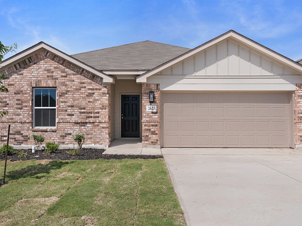 2623 Echinacea Path Exterior. One Side Brick, Coach Light, Two Car Garage, Covered Porch