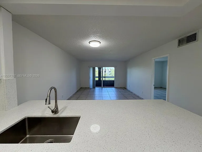 7730 Camino Real #F406 — Photo 5