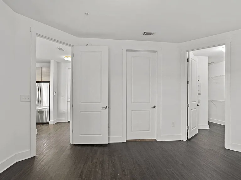 Bedrooms with walk-in closets and built in shelving
