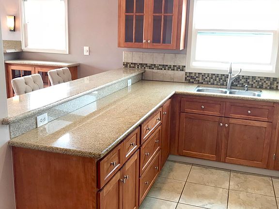 Updated Kitchen, including granite counter-tops and custom cabinetry