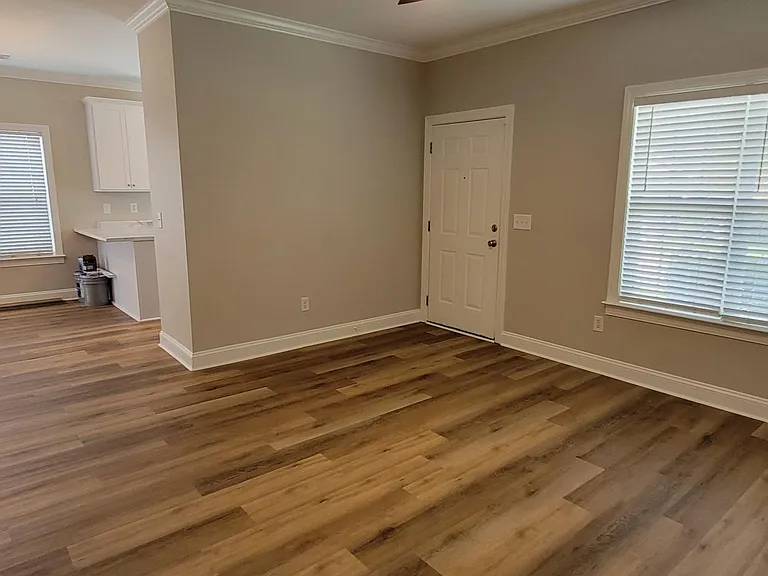 Large Living Room leads to breakfast area.