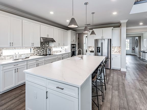 Beautiful Quartz Counters with Built-in Stainless Appliances