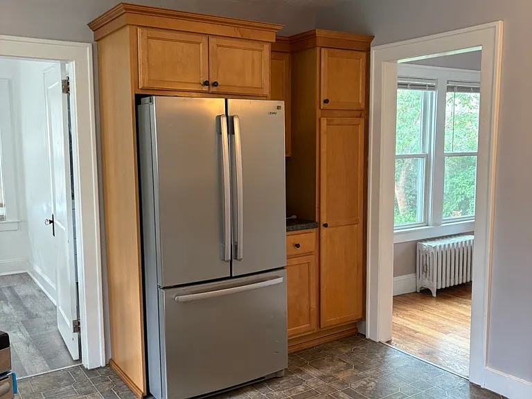 Kitchen. Dining room to the right. Office, half bath and laundry to the left.