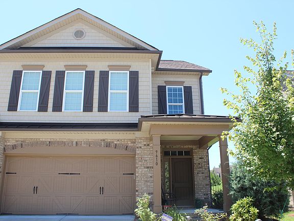 Front side of the building with garage