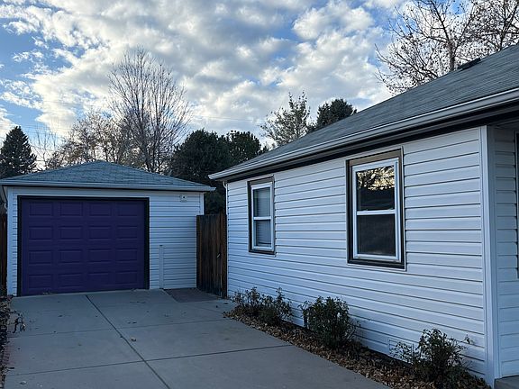 Left side of house, garage & driveway