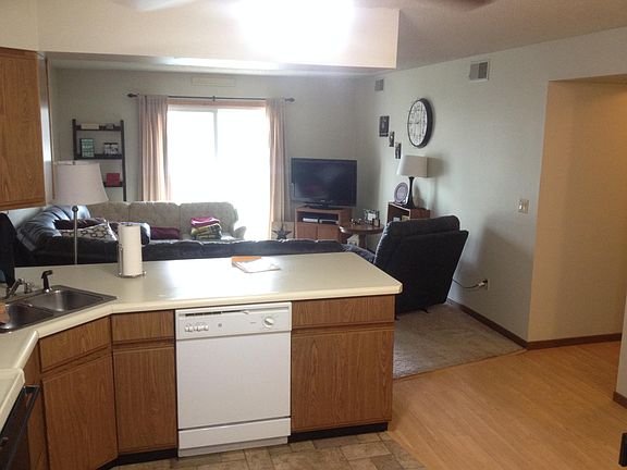 Kitchen opens to living room.